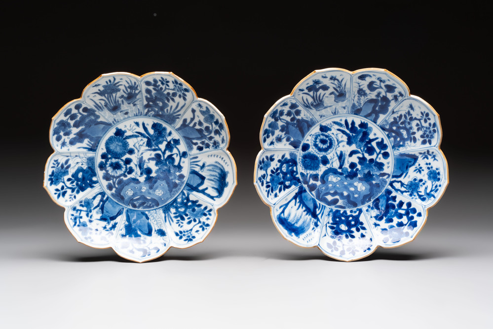 A pair of Chinese blue and white lotus-form 'grasshopper' plates, Kangxi