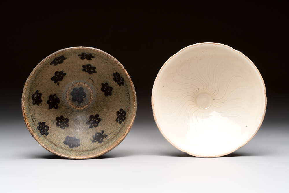 A Chinese Jizhou papercut resist-decorated 'plum blossom' bowl and a white-glazed bowl, Southern Song/Ming