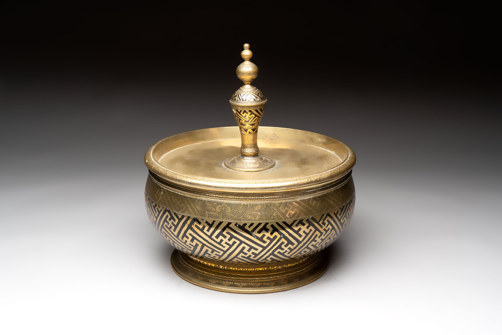 A brass betel bowl and cover with black-enamelled and engraved design, Indonesia, 19th C.