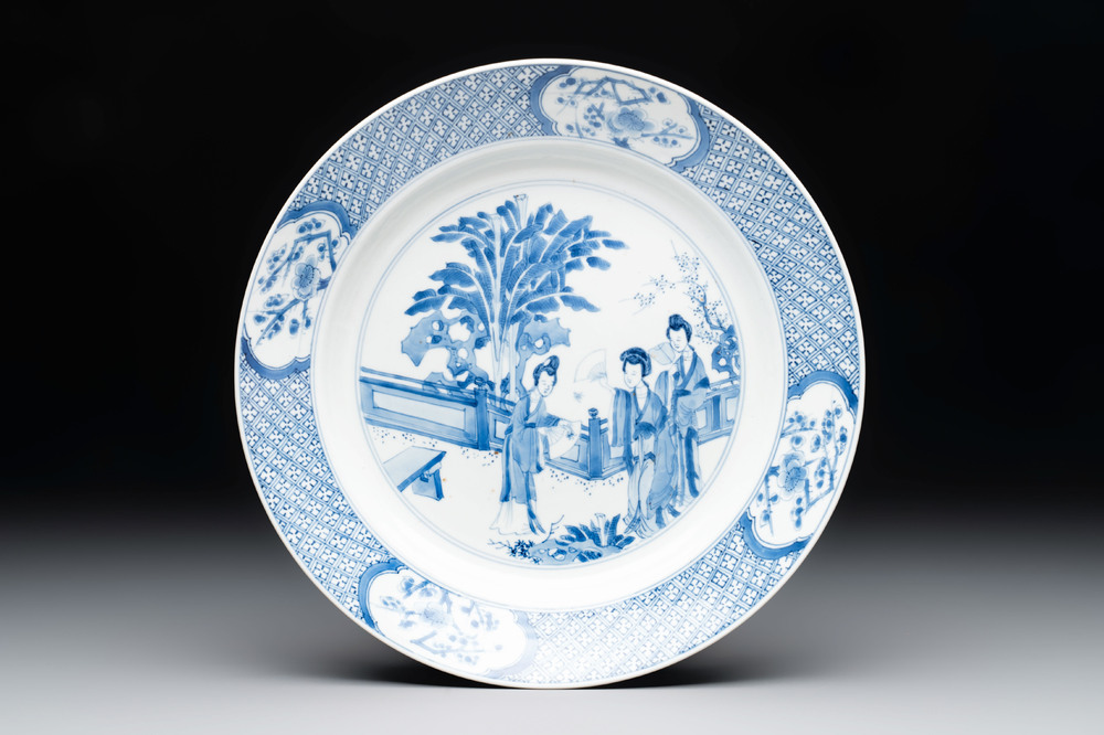 A Chinese blue and white 'elegant ladies' dish, Kangxi mark and of the period