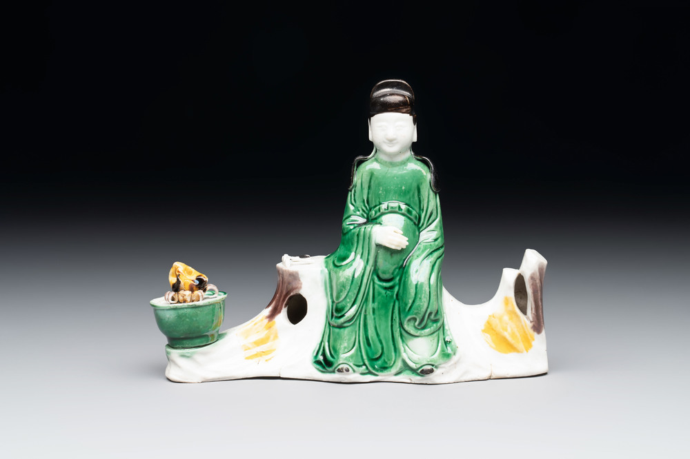 A Chinese verte biscuit 'scholar' brush rest, Kangxi