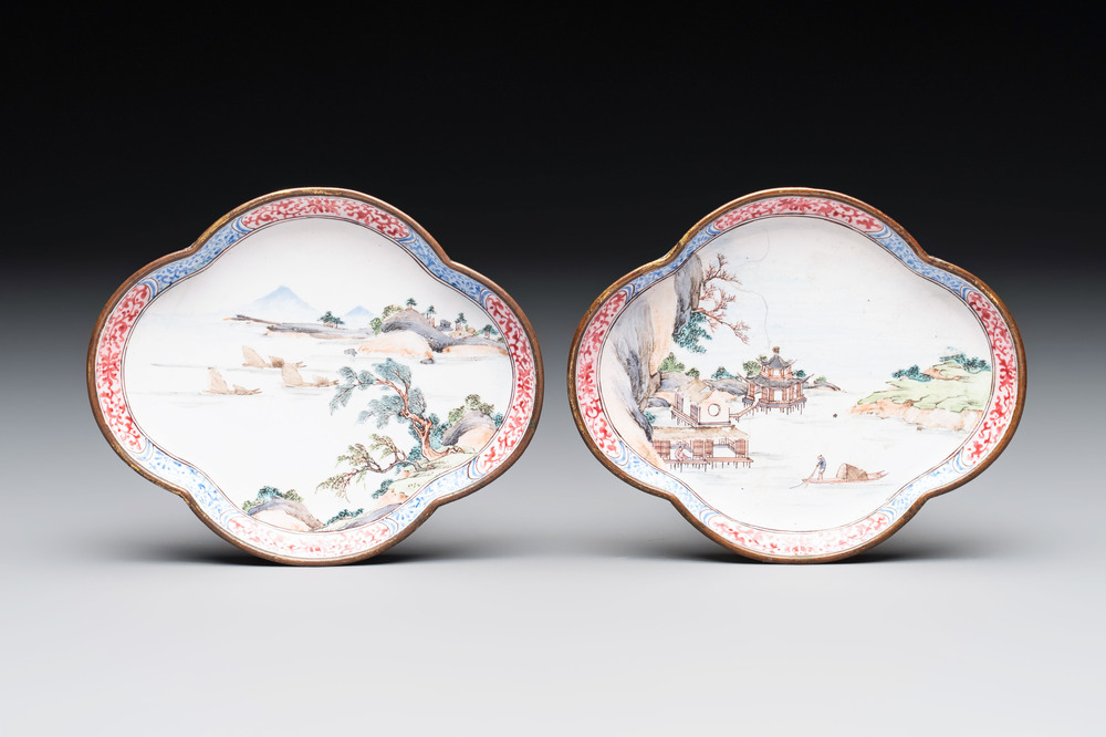 A pair of Chinese Canton enamel quadrifoil 'riverscape' saucers, Yi Qi 亦奇 mark, 18th C.