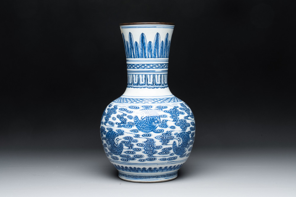 A Chinese blue and white copper-mounted 'cranes among clouds' vase, 18th C.