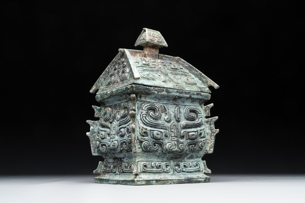 A Chinese archaic bronze inscribed wine vessel with buffalo design, 'fangyi 方彝', Western Zhou