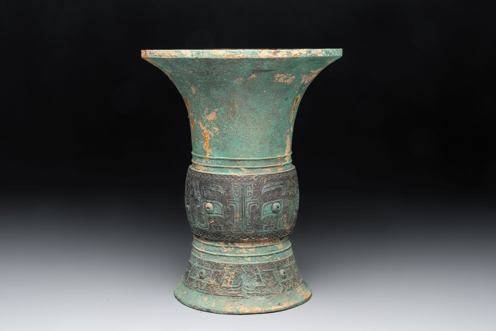 A Chinese archaic bronze wine vessel with taotie design, 'zun 尊', Western Zhou