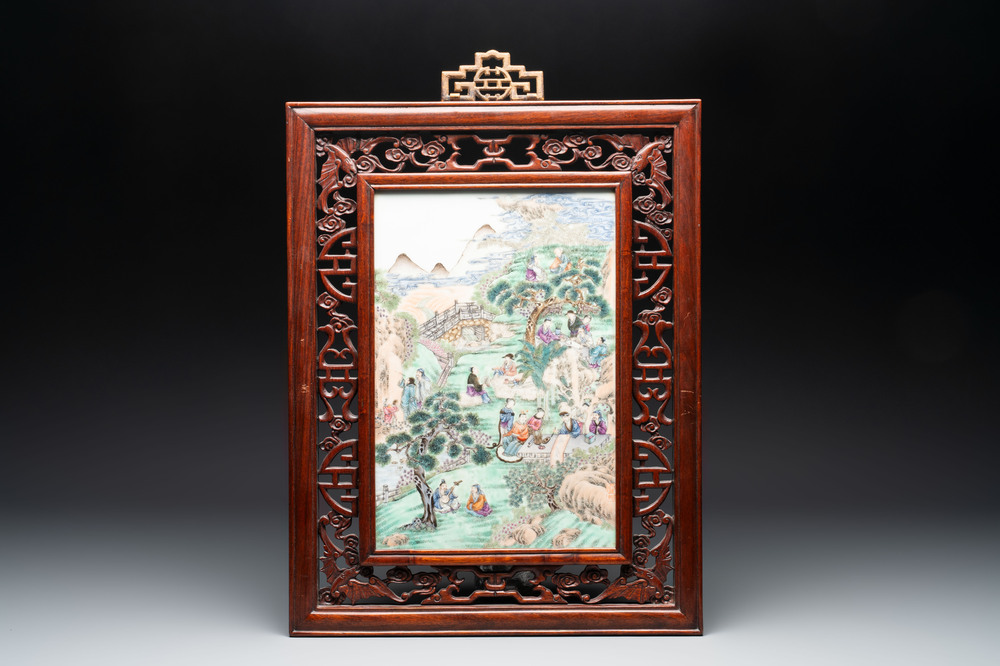 A Chinese famille rose 'gathering of sages' plaque, mounted in a wooden frame, Republic