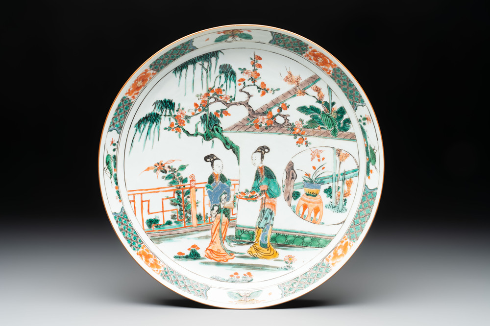 A Chinese famille verte 'ladies in a garden' dish, Kangxi