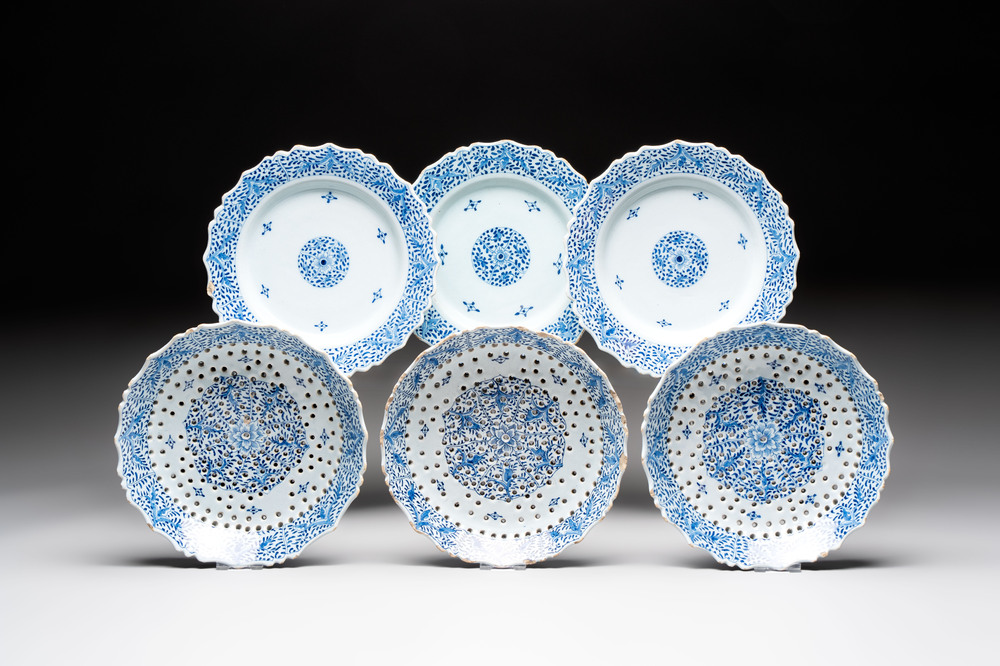 Three blue and white Dutch Delft strawberry strainers on stands, 18th C.
