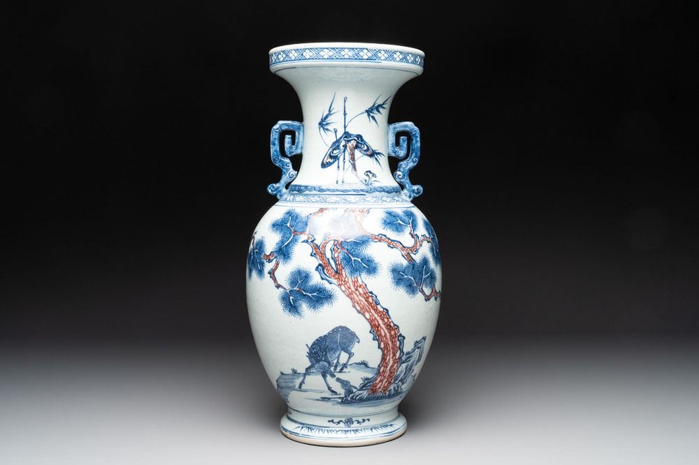 A Chinese blue, white and copper-red 'deer and pine tree' vase, Qianlong