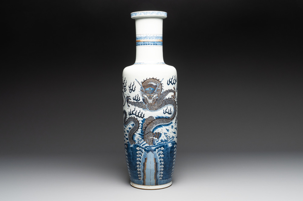 A large Chinese gilt-decorated blue and white 'dragon' rouleau vase, 19th C.