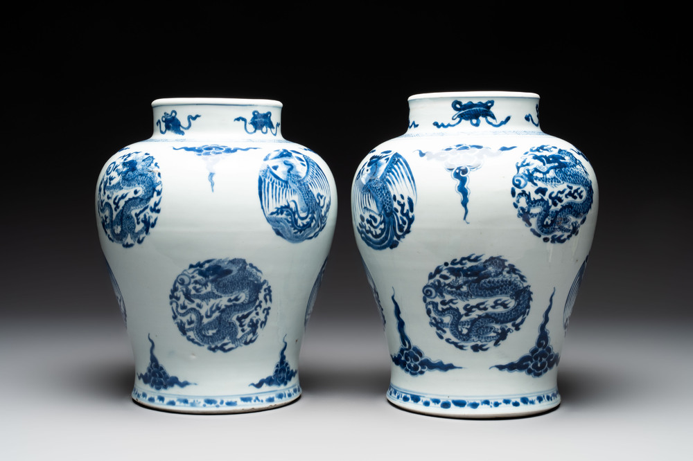 A pair of Chinese blue and white 'dragons and phoenixes' vases, Kangxi