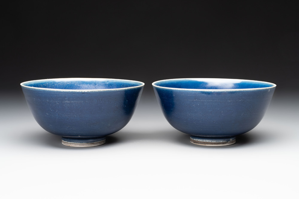 A pair of Chinese blue-glazed 'Hatcher Cargo' bowls with incised dragons, Transitional period