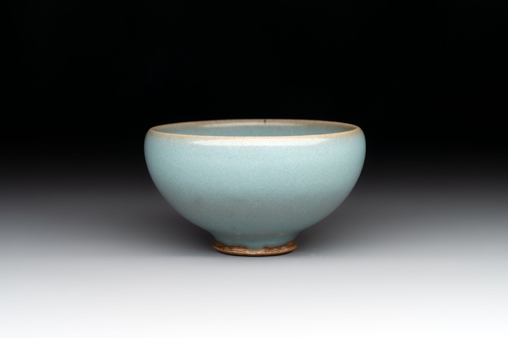 A small Chinese blue-glazed 'jun' tea cup with a wooden box, Song/Yuan