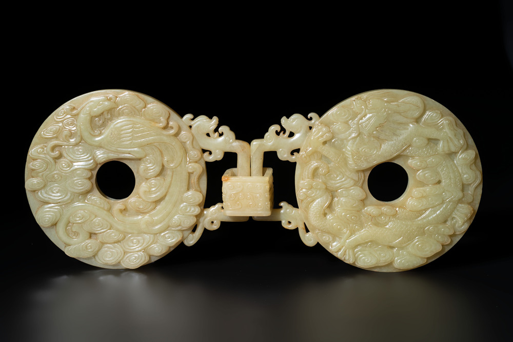 An imperial Chinese yellow jade 'dragon and phoenix' twin 'bi' disc, Qing