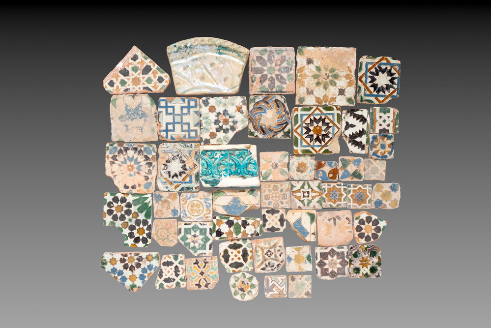 A varied collection of 46 polychrome Spanish and two Islamic tiles and fragments, 13/16th C.