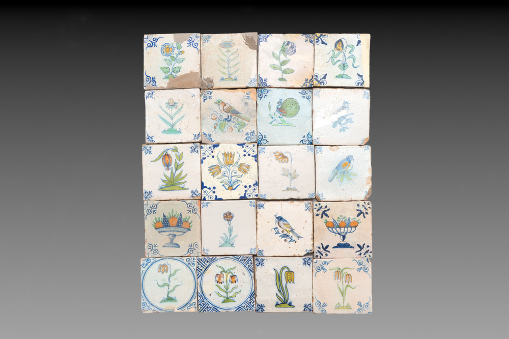 20 polychrome Dutch Delft tiles with birds, flowers and fruit bowls, 17th C.