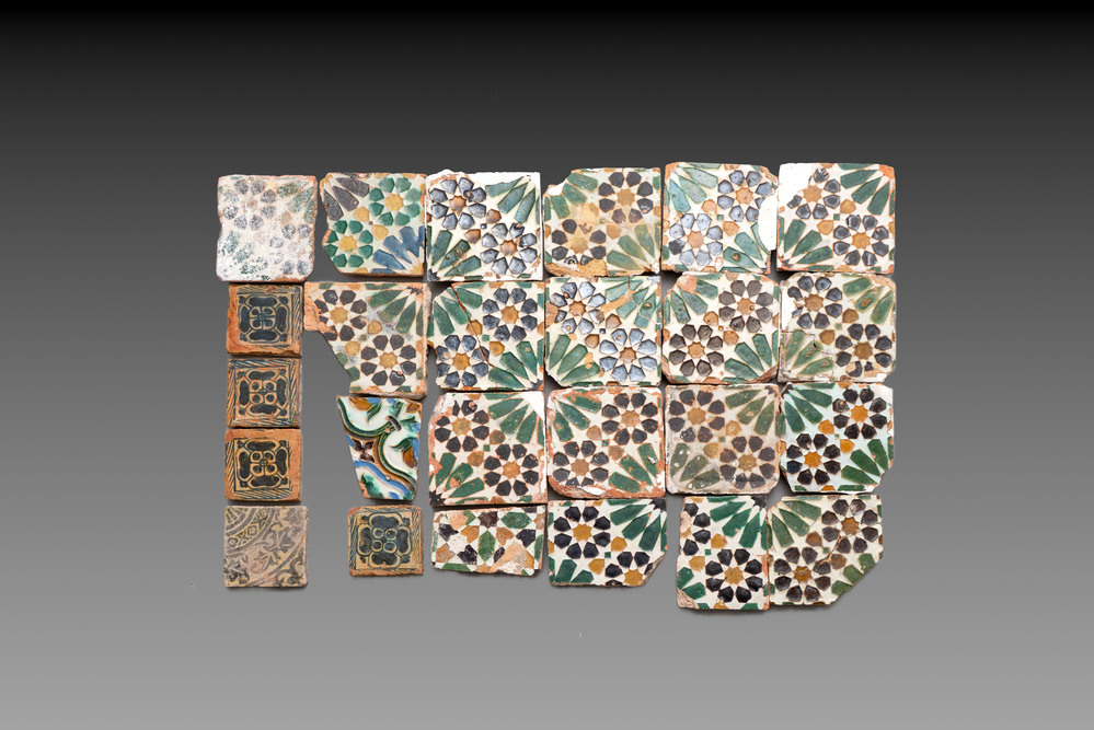 A varied collection of 24 polychrome Spanish tiles, Seville and Valencia, 15/16th C.