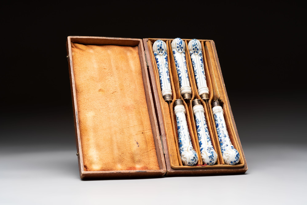 A set of six knives with Chinese gilt and blue-enamelled porcelain handles, in a case, Qianlong