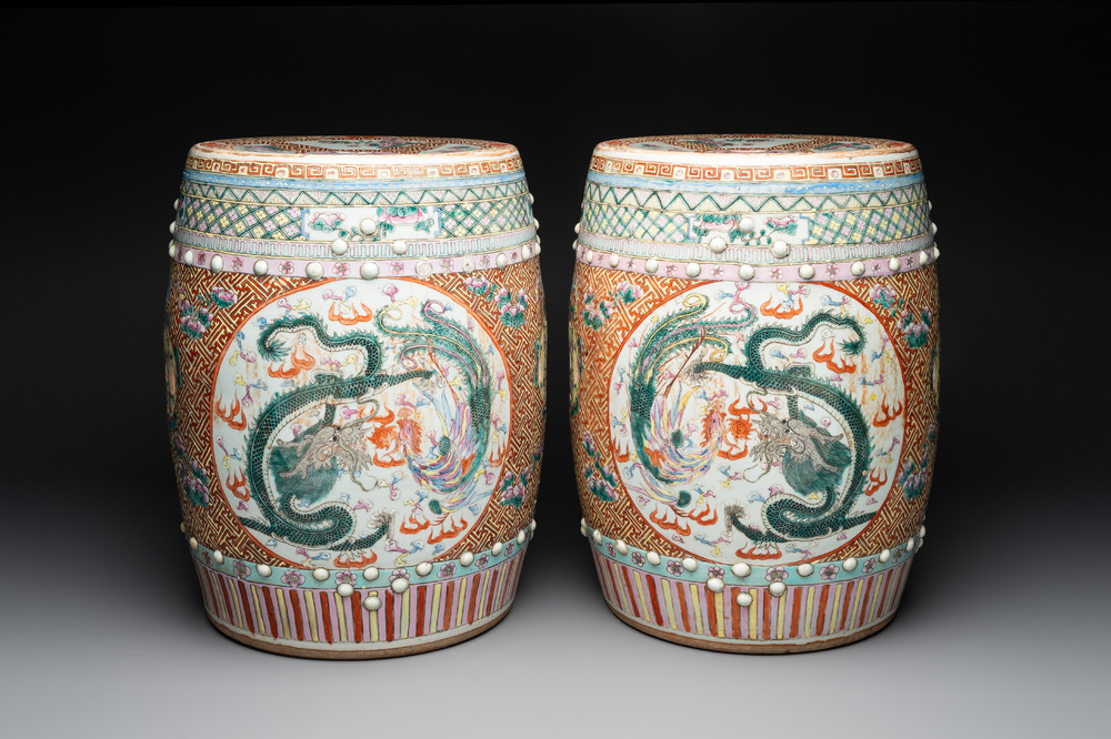 A pair of Chinese famille rose 'dragon and phoenix' garden seats, 19/20th C.