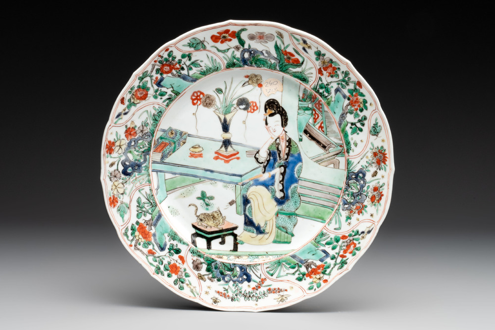 A Chinese famille verte 'lady and her cat' dish, Ding mark, Kangxi