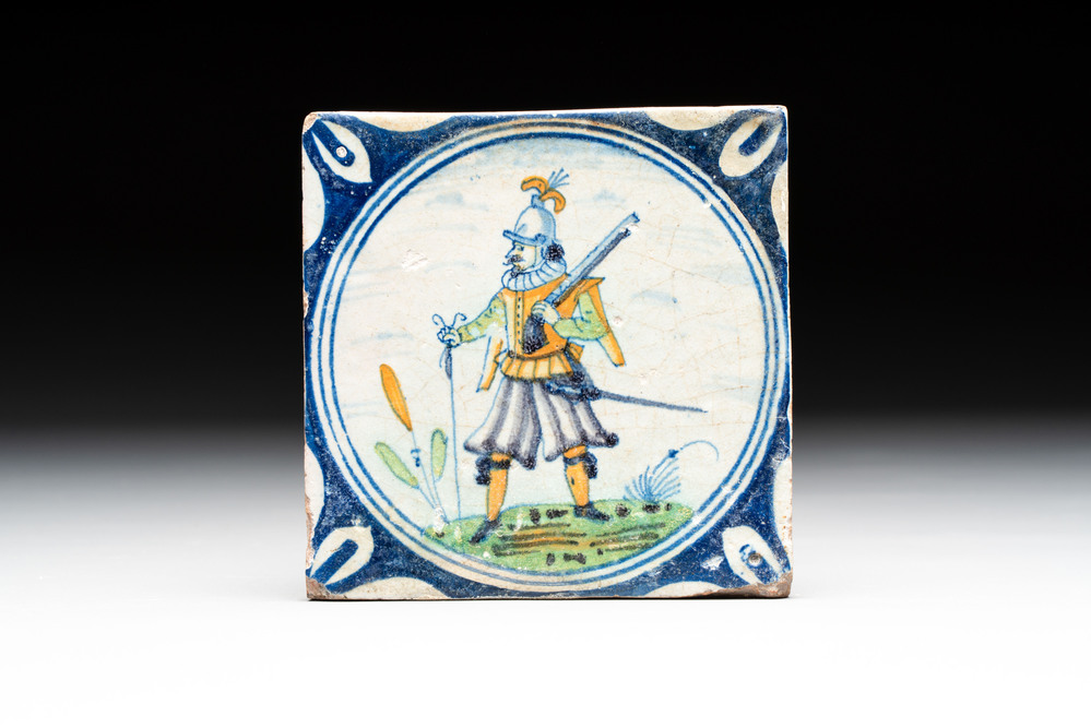 A polychrome Dutch Delft maiolica 'soldier' medallion tile, late 16th C.