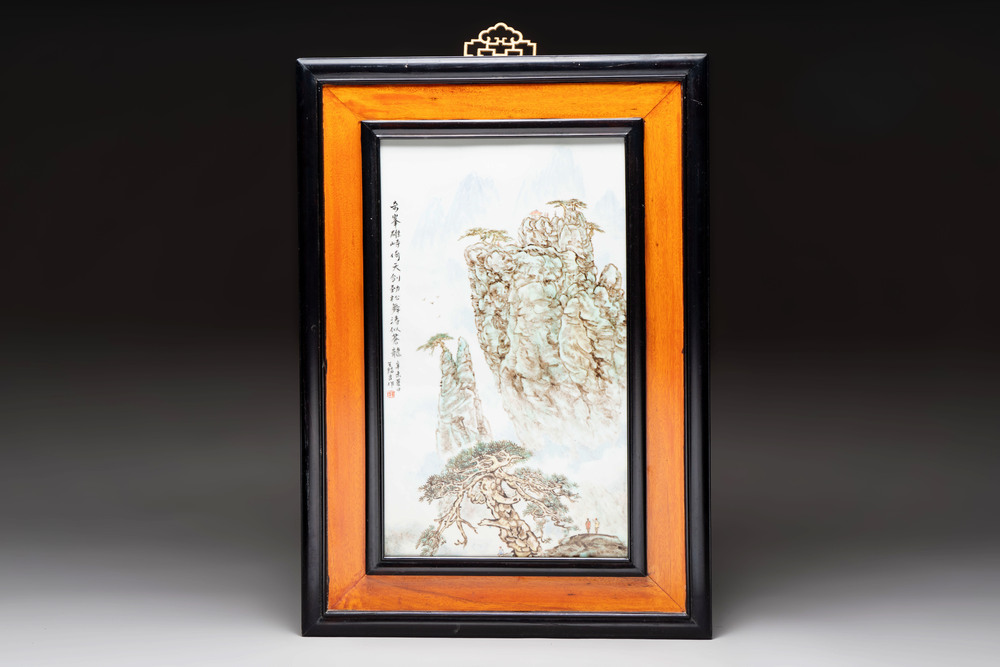 A Chinese famille rose &lsquo;mountainous landscape&rsquo; plaque in wooden frame, signed Wang Xiliang 王锡良, dated 1931