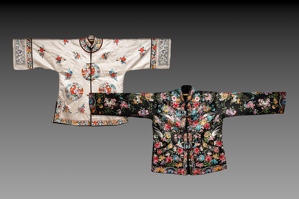Two Chinese embroidered silk women's robes, 20th C.