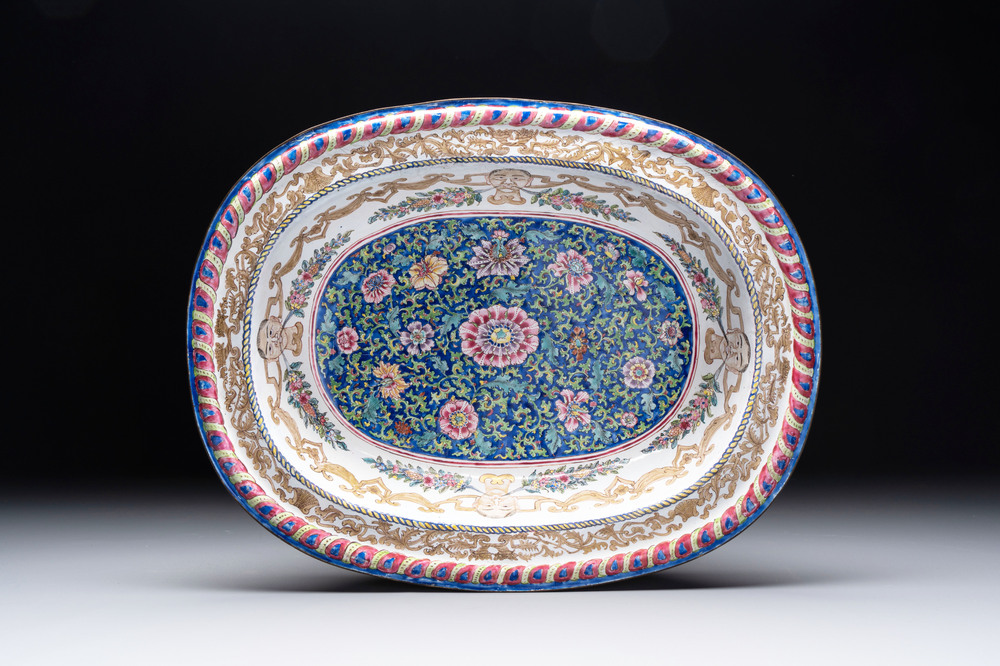 A large Chinese Canton enamel basin with garlands decorated with male heads, Qianlong