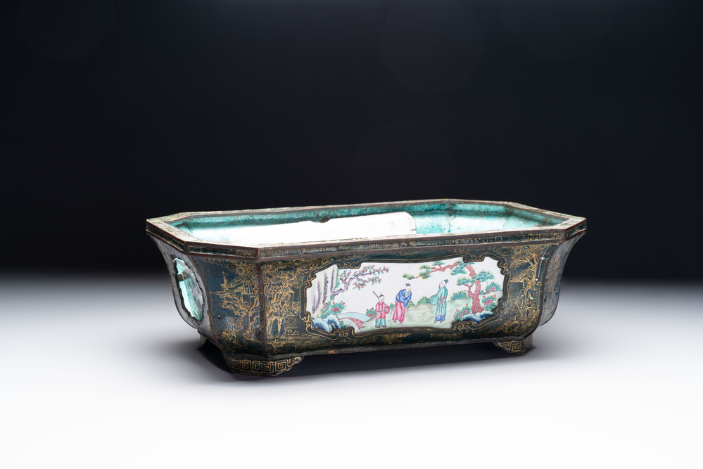 A Chinese Canton enamel gilt-decorated dark-green-ground jardini&egrave;re with four inserted plaques, Qianlong/Jiaqing