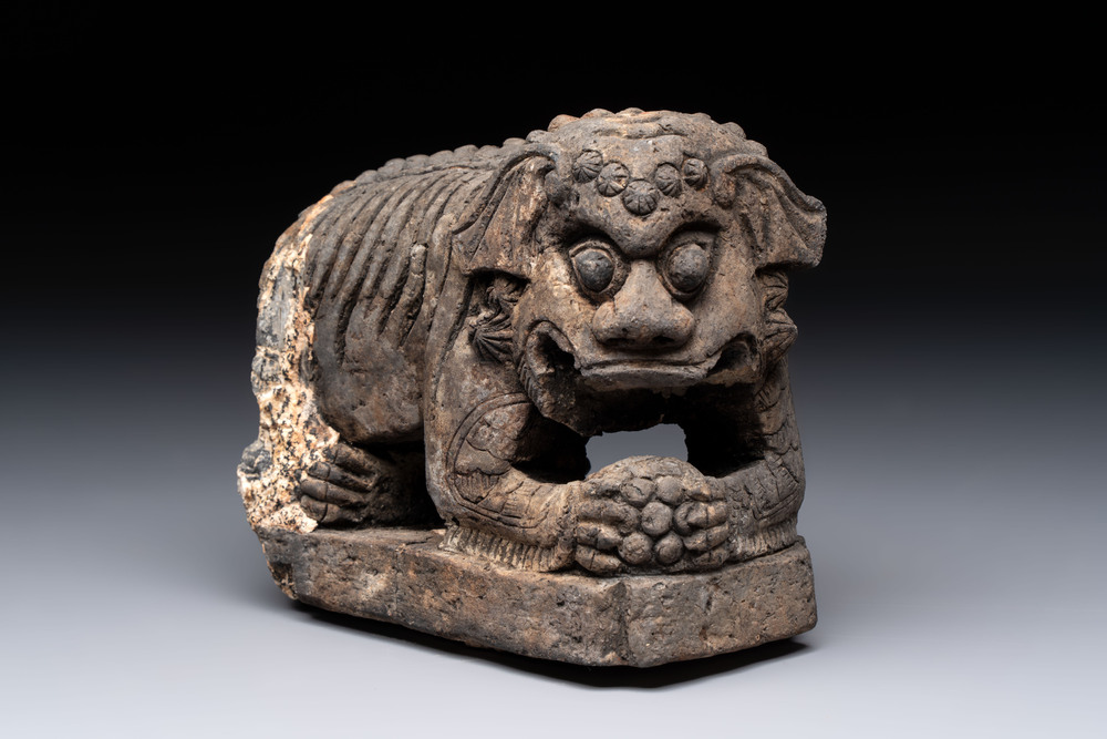 A grey stoneware Buddhist lion, Southeast Asia, 19th C.
