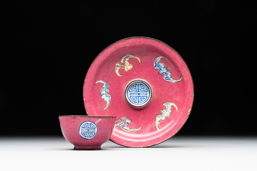 A rare Chinese Canton enamel ruby-ground 'Bats and Shou' cup on stand, Qianlong mark and of the period