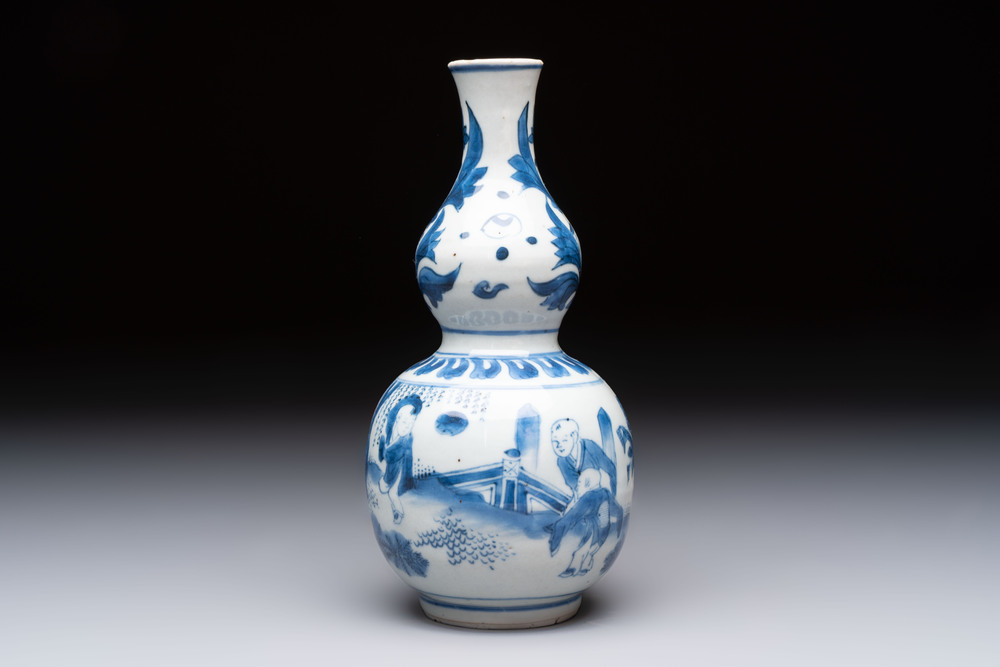 A Chinese blue and white 'playing boys' double gourd vase, Transitional period