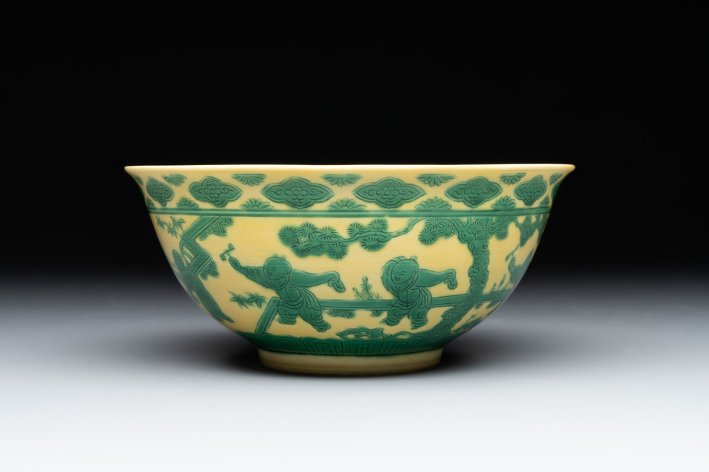 An imperial Chinese green-enamelled yellow-ground 'playing boys' bowl, Yongzheng mark and of the period