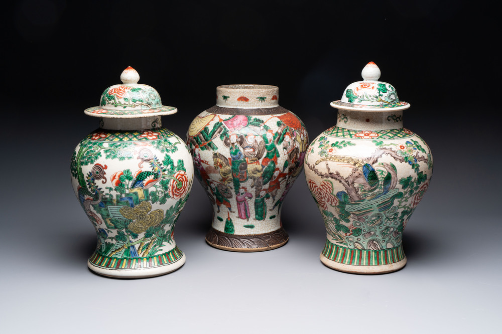 Two Chinese Nanking famille verte covered vases and a famille rose vase, 19th C.
