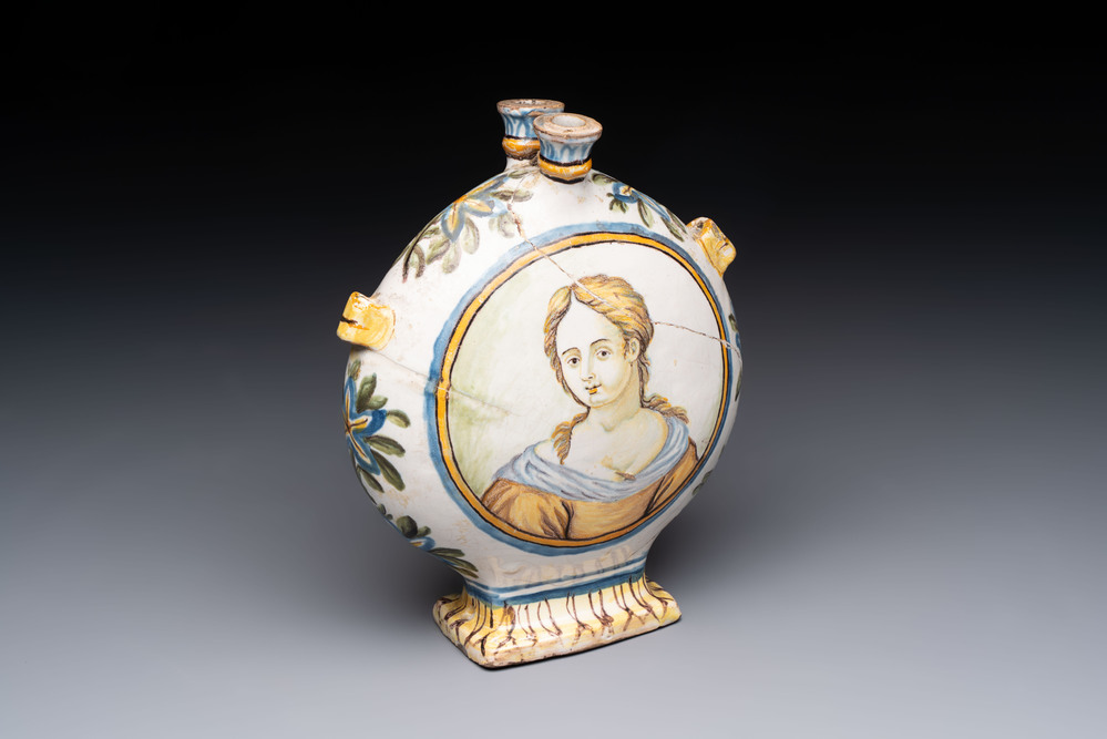 A polychrome Italian maiolica pilgrim bottle with two portrait busts, Castelli, 18th C.