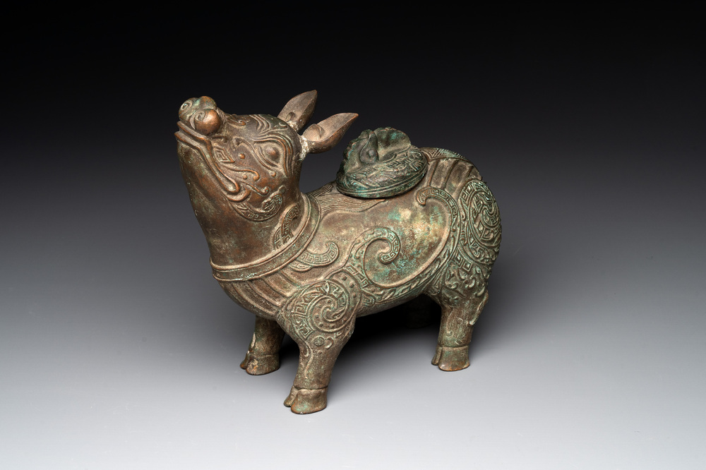 A rare Chinese inscribed bronze tapir-form vessel and cover, 'xizun 犧尊', late Ming/early Qing
