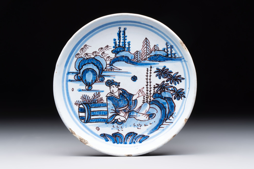 A blue, white and manganese Nevers Transitional style chinoiserie dish, France, 17th C.