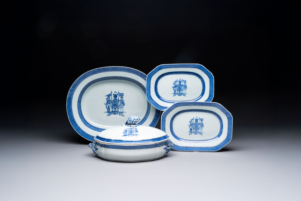 A set of two Chinese blue and white armorial dishes, a stand, and a tureen with the arms of Hughes for the English market, Qianlong, ca. 1790