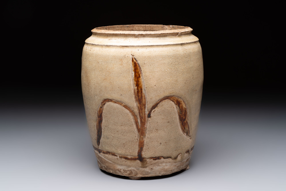 An Annamese or Vietnamese brown-glazed cream-ground 'grass sprigs' jar, 12/13th C.