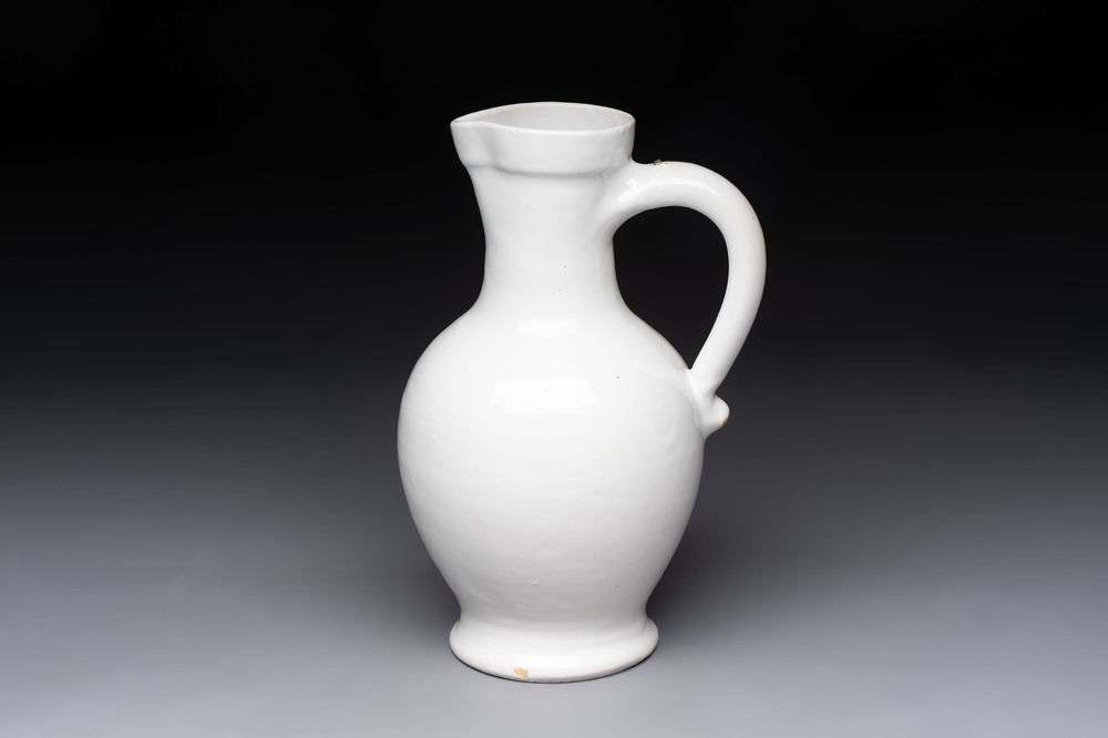 A white-glazed Delftware wine jug, early 18th C.
