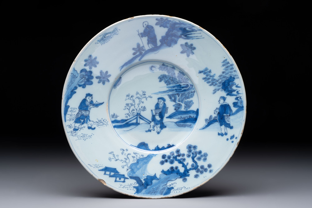 A blue and white Dutch Delft chinoiserie plate, 17th C.