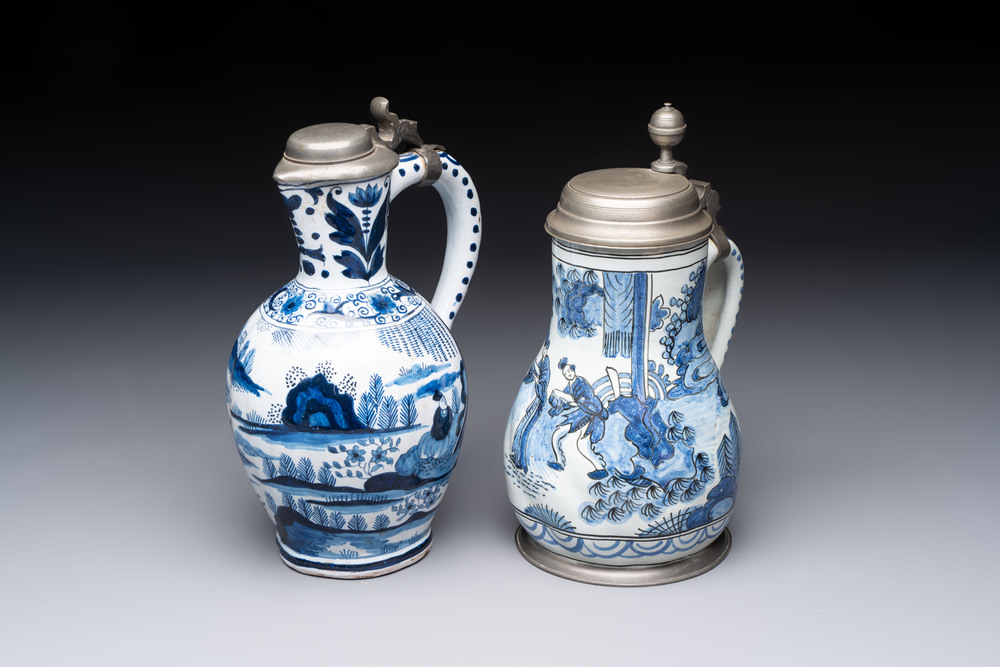 Two blue and white Dutch Delft chinoiserie jugs with pewter lid, 17/19th C.