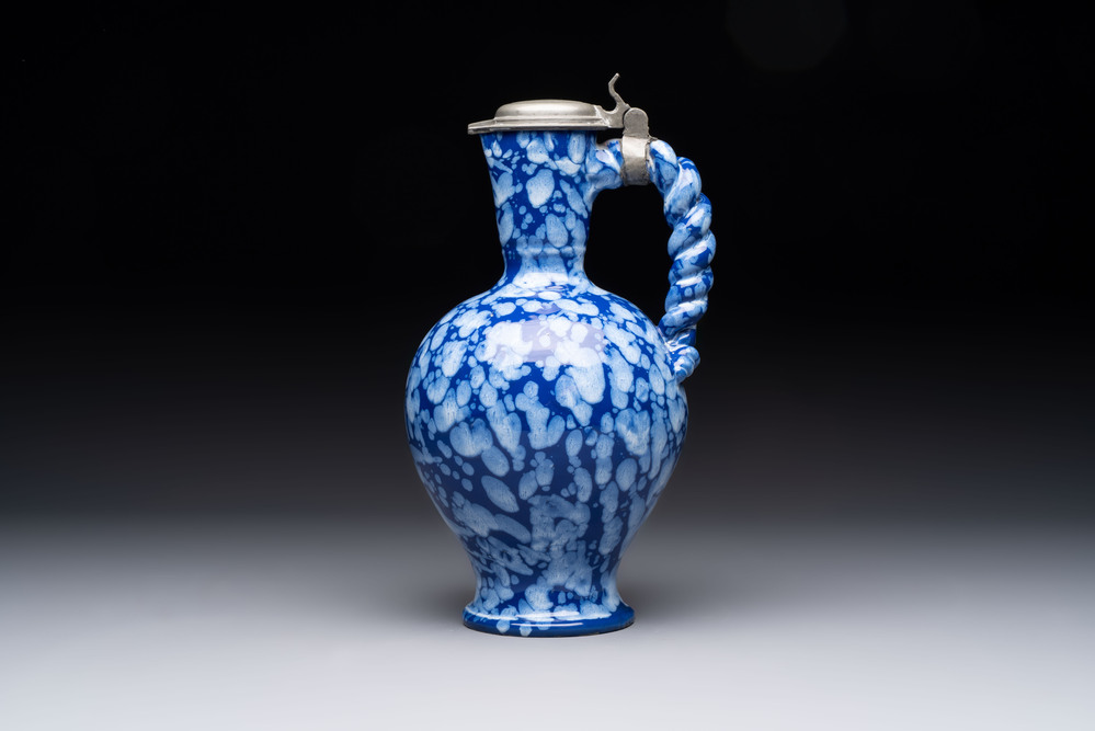 A rare Nevers pewter-mounted white-splashed blue-ground '&agrave; la bougie' ewer with rope twist handle, France, late 17th C.