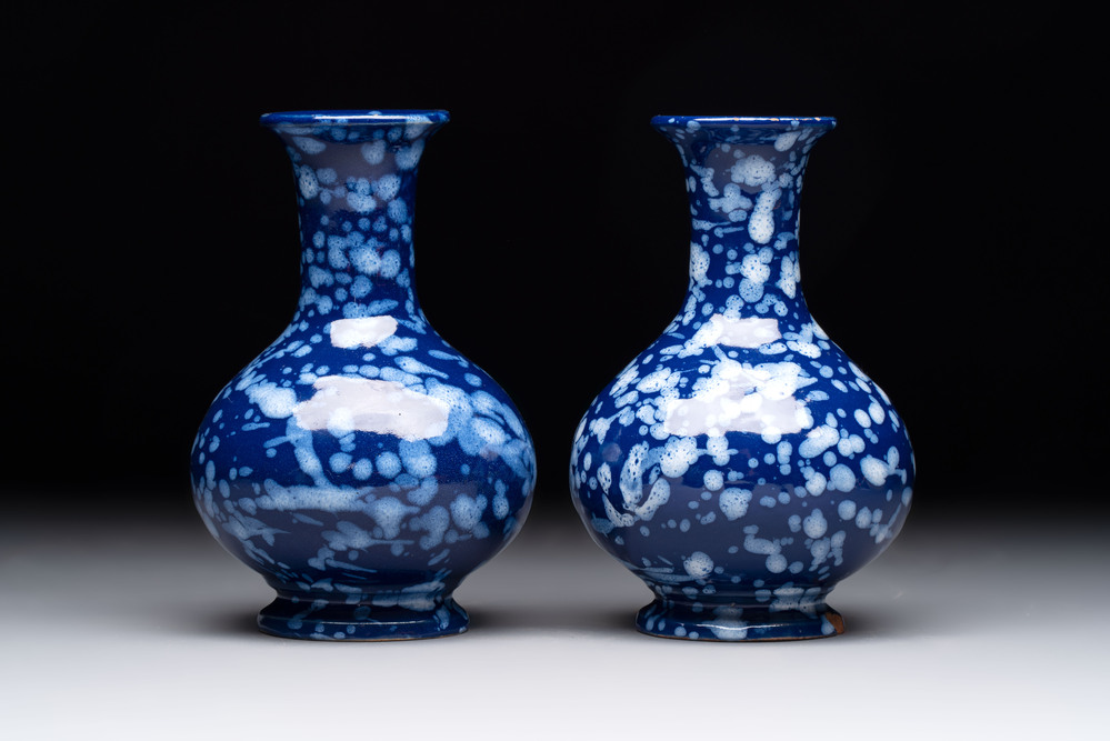 A pair of Nevers white-splashed blue-ground '&agrave; la bougie' vases, France, late 17th C.
