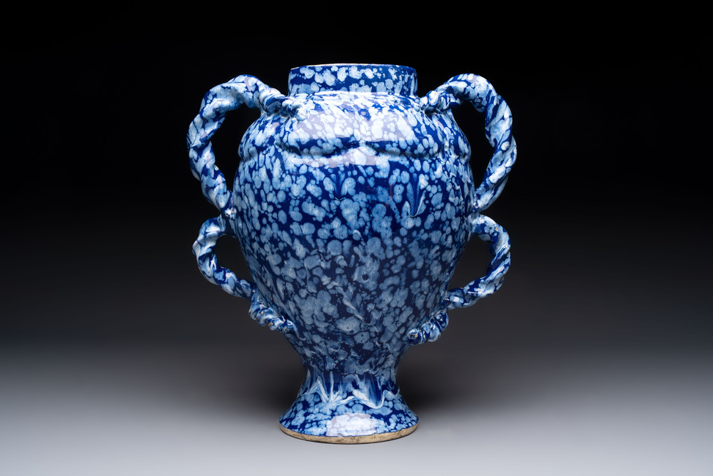 A rare large Nevers white-splashed blue-ground rope twist handled vase with '&agrave; la bougie' decor, France, 17th C.