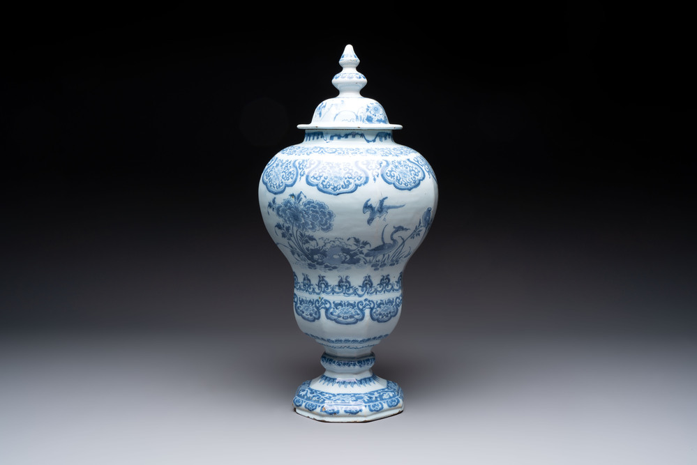 A blue and white Dutch Delft baluster vase and cover with birds among flowering branches, late 17th C.