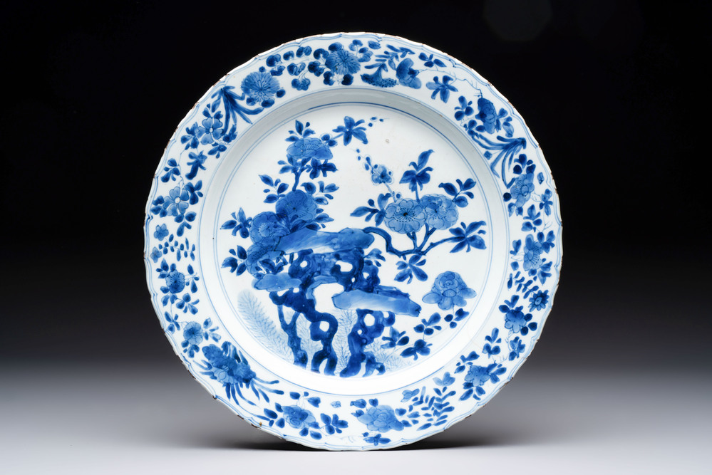 A Chinese blue and white dish with floral design, Kangxi mark and of the period