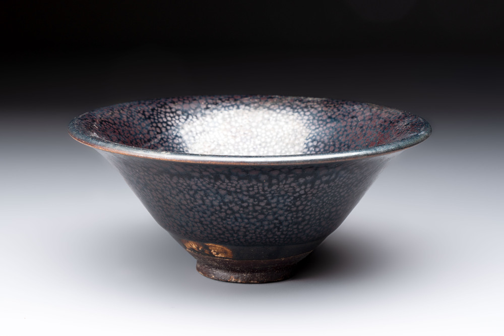 A rare Chinese black-glazed 'oil-spot' tea bowl, Song/Jin