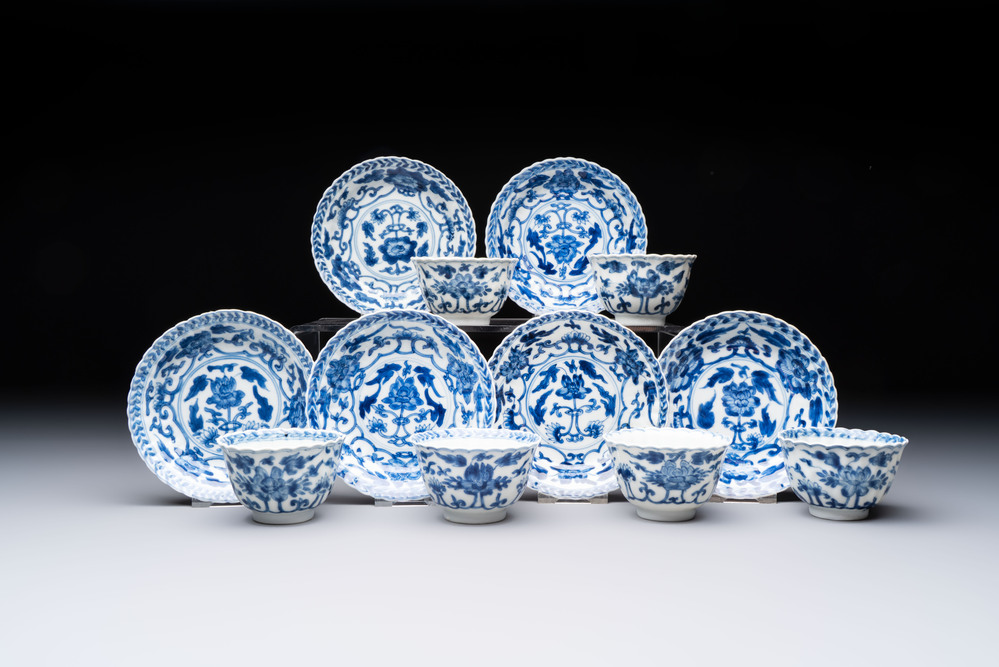 A set of six Chinese blue and white cups and saucers with floral design, Kangxi