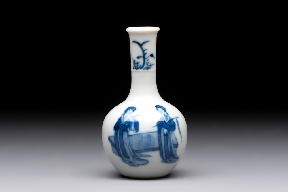 A fine Chinese blue and white miniature bottle vase with two ladies in a garden, jade 玉 mark, Kangxi